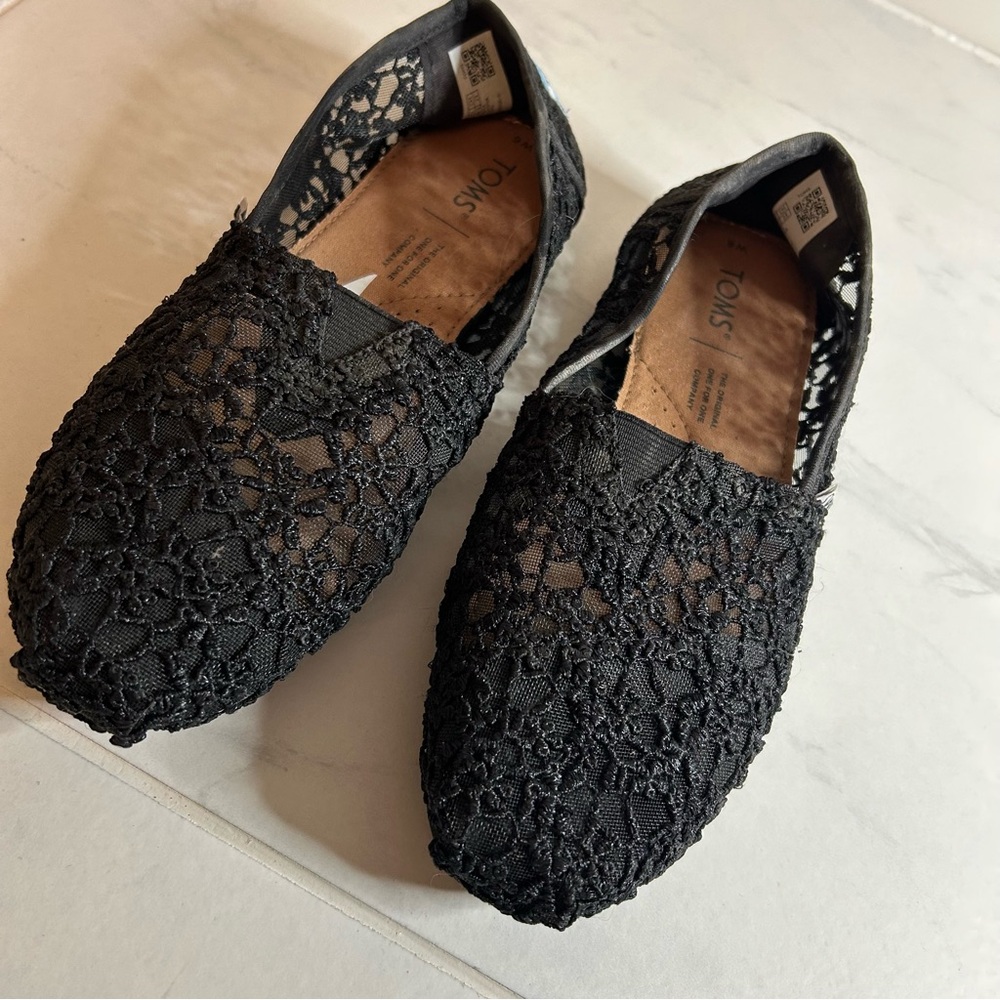 TOMS Black Lace flats.  Like new!